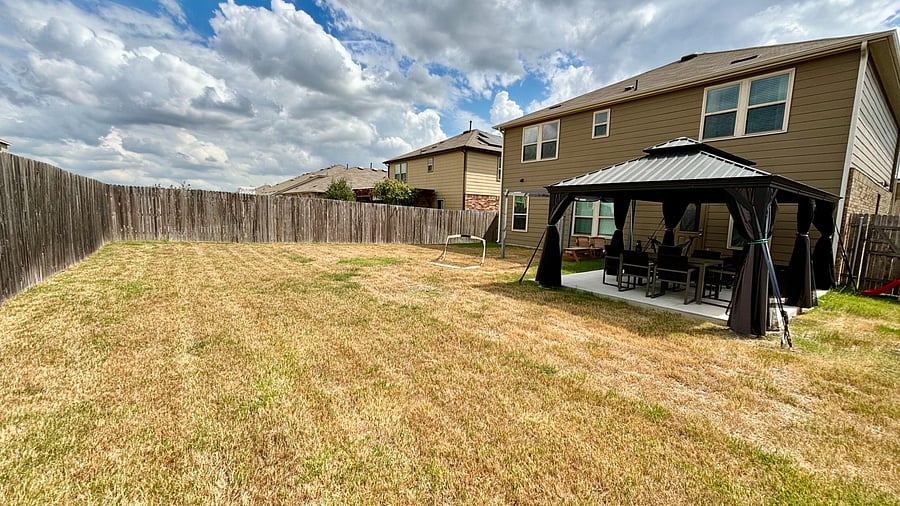 Tons of green space for fresh air. Features a massive covered patio for year-round comfort in a quiet neighborhood.