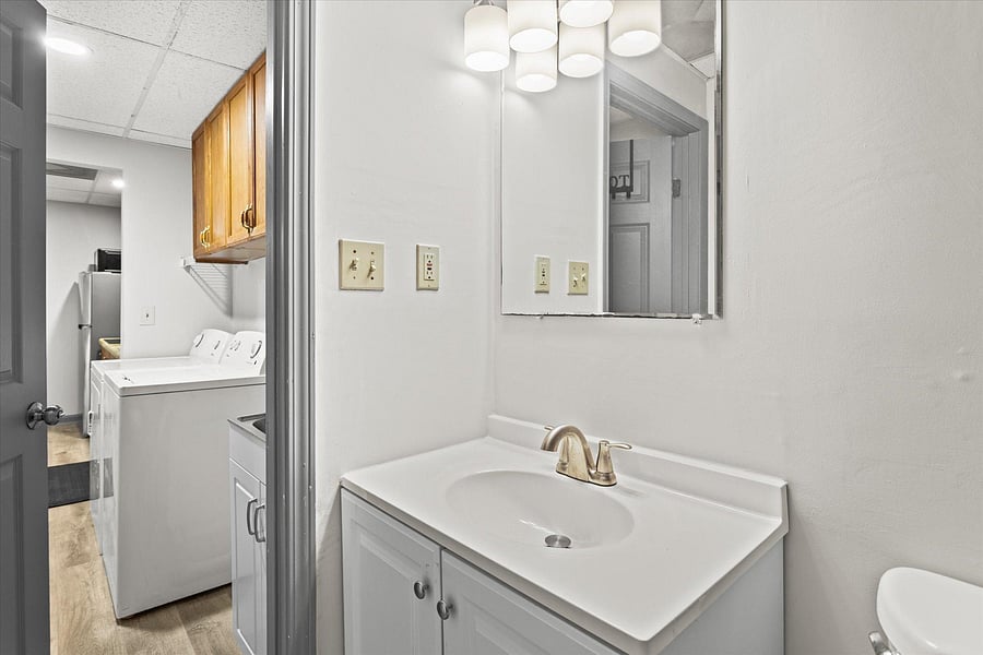 Bathroom #3 is a shared bathroom located in the basement. Rooms #5 and 6 share this bathroom.