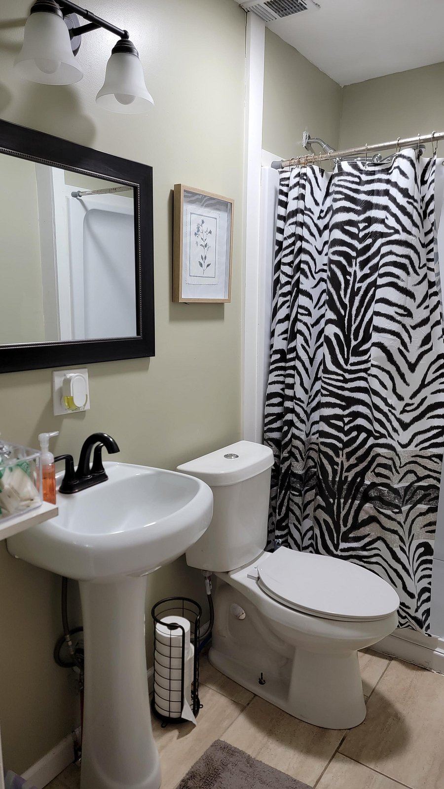 Full bathroom with shower. Access to extra shared bathroom