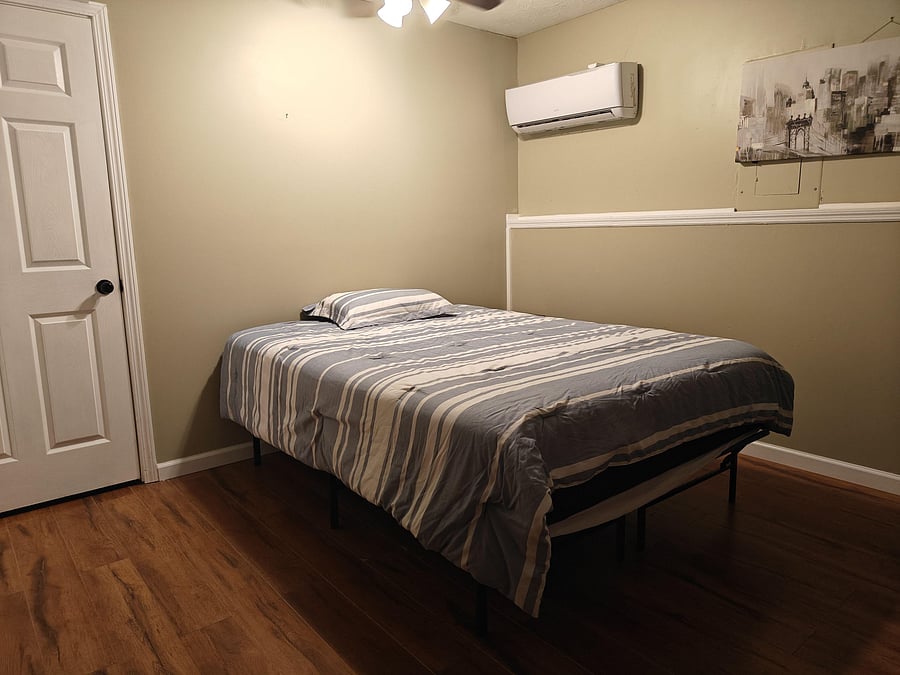 Queen Bed (only mattress protector and fitted sheet provided)