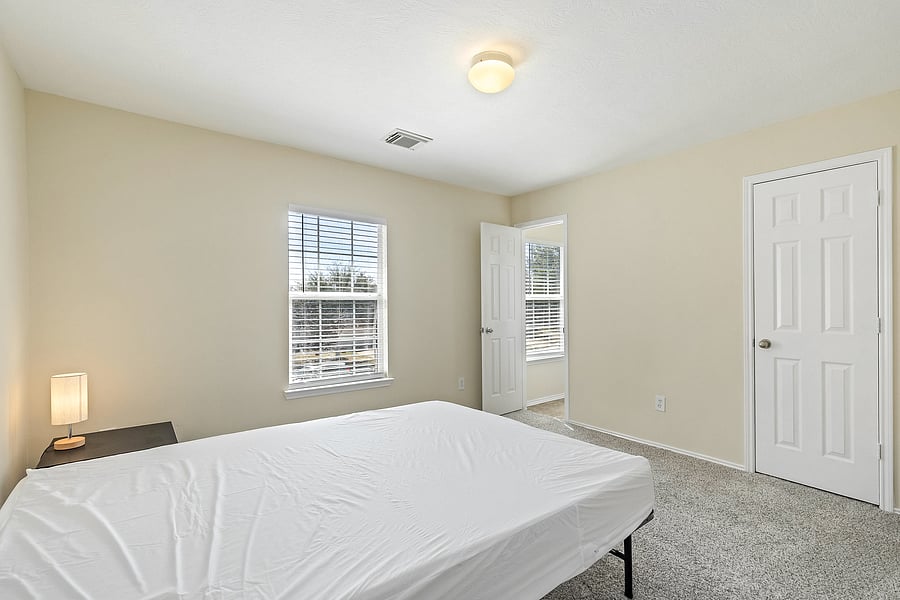Beautiful room, Plush carpet w nightstand! Lamp is LED with charge port. Comes with walkin closet! Jack N Jill Bath is a plus