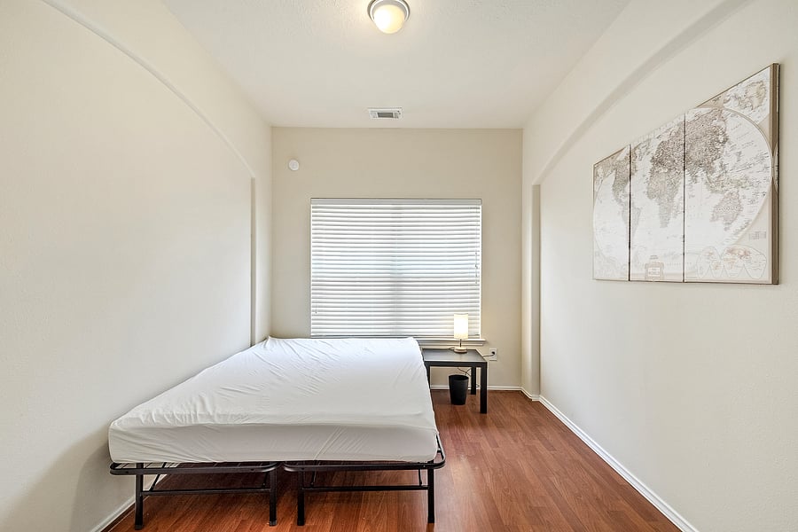 Beautiful room, hard wood floor and nightstand! Lamp is LED with charge port.