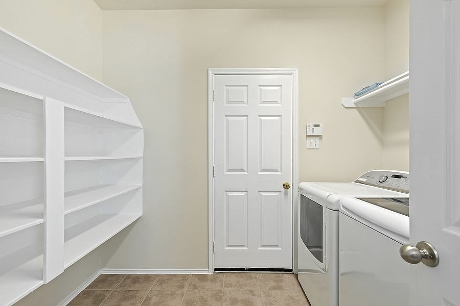 This pantry is a dream! Spacious for housing goodies and treats and includes luxury washer and dryer!