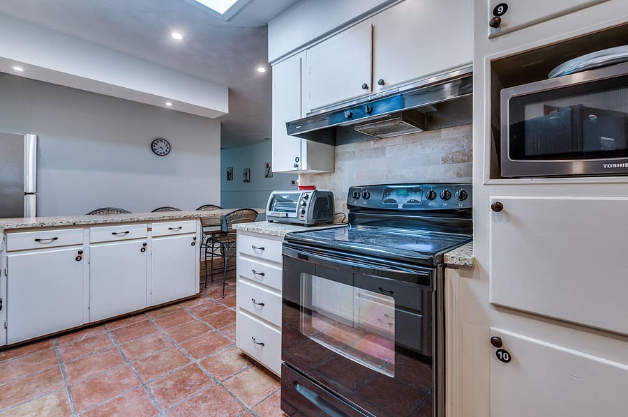 Labeled kitchen cabinets for easy, harmonious living