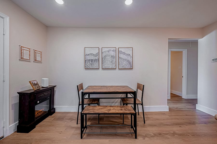Dining Room featuring Adjustable Fireplace