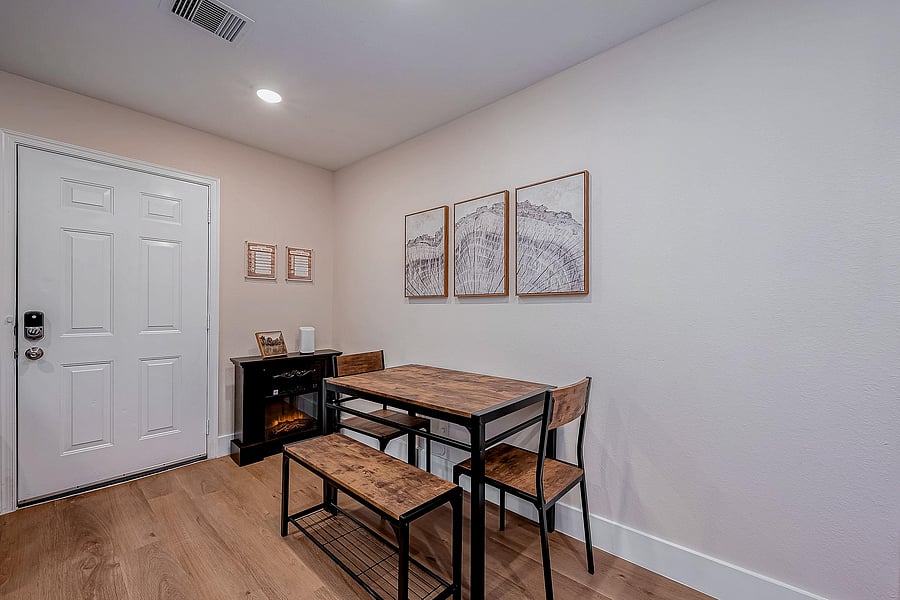 Dining Room featuring Adjustable Fireplace