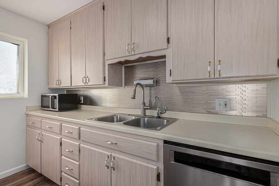Lots of Cabinet Space, Modern Stainless Steel Backsplash