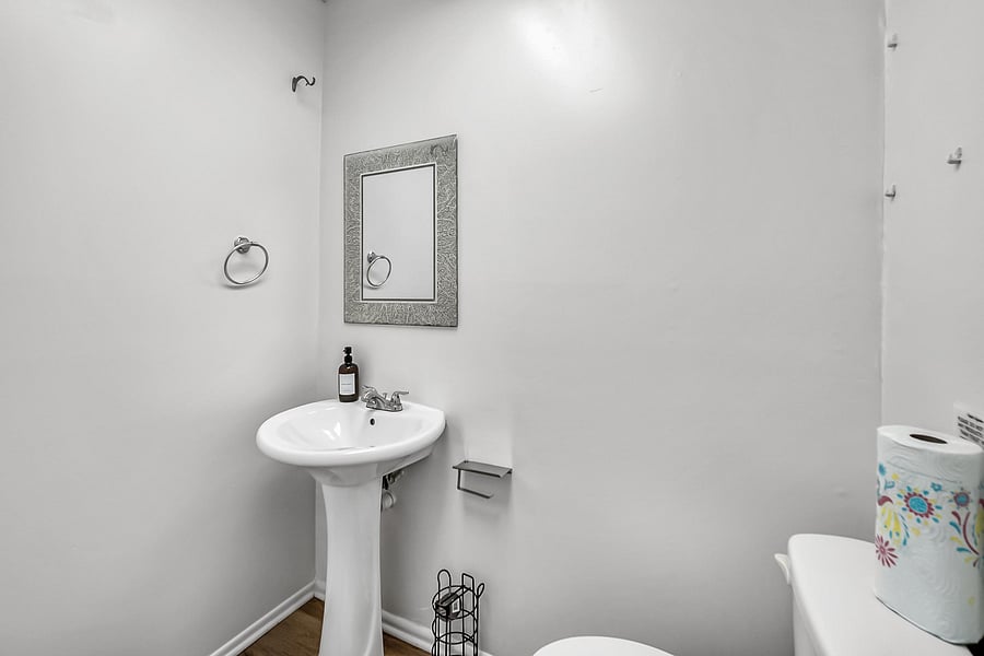 Half bathroom next to bedrooms 5, 6