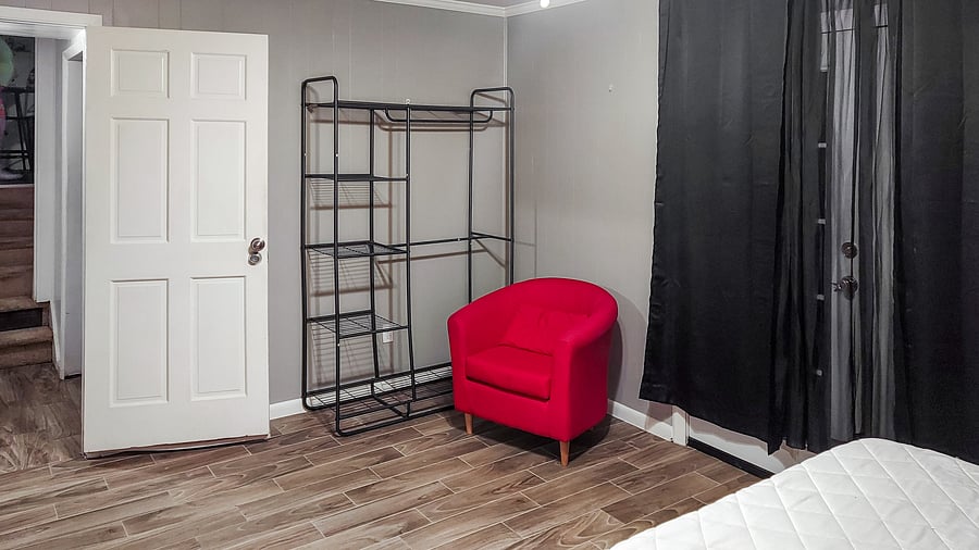 Room is downstairs, next to laundry, connects to common glassed in patio room.