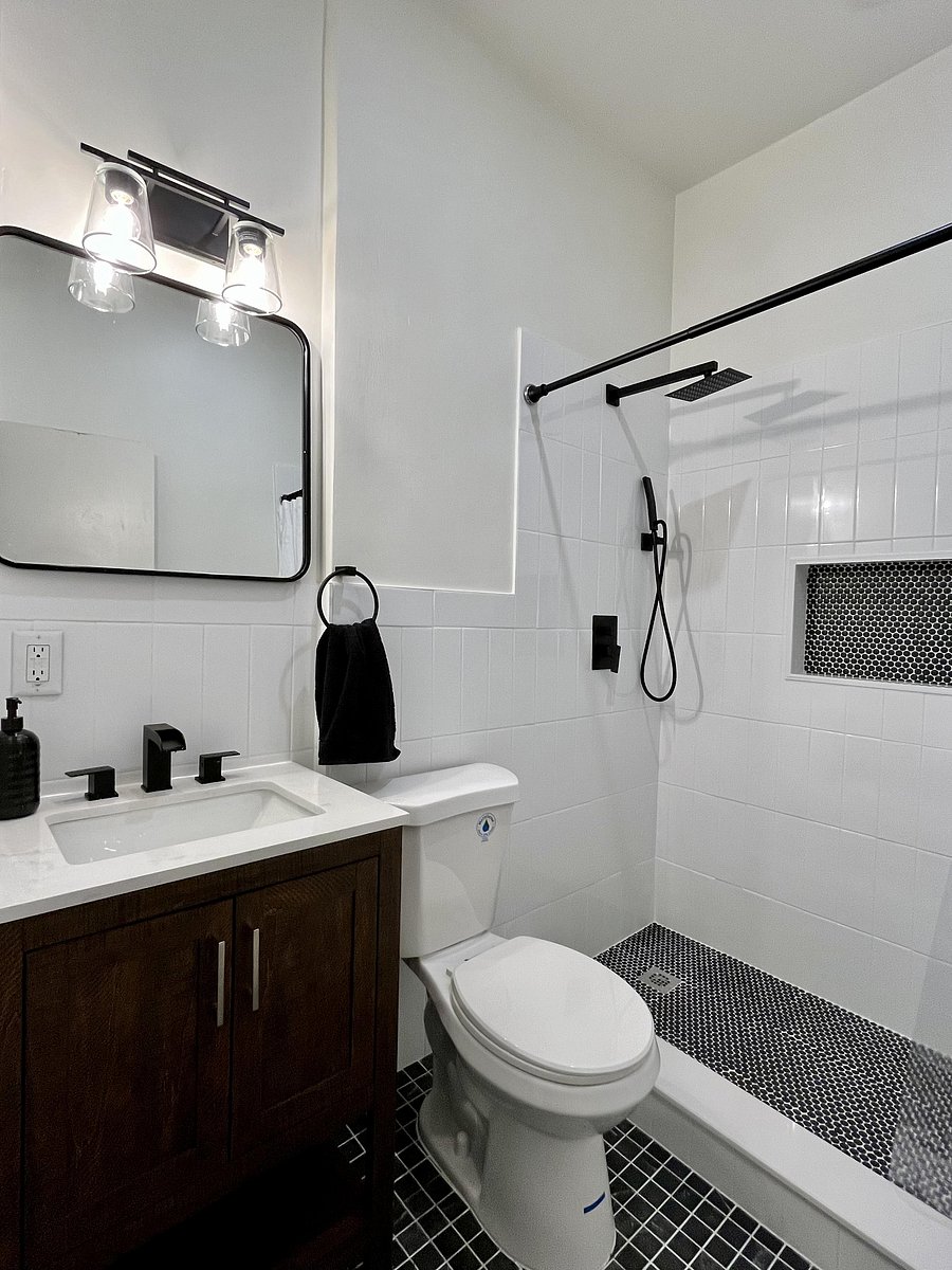 New modern bathroom with modern vanity & walk in shower