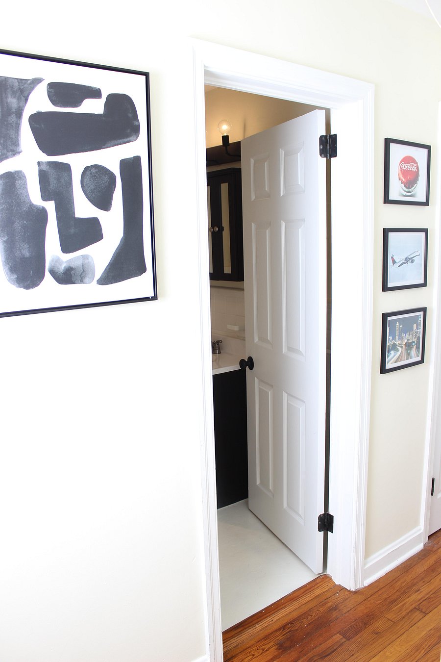 HALLWAY LEADING TO SHARED BATHROOM