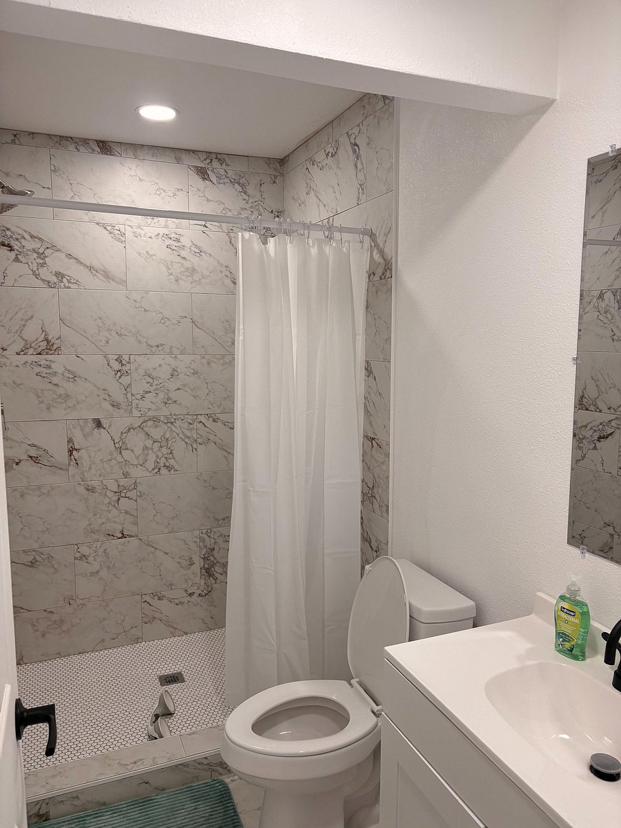 Standing shower by the common area