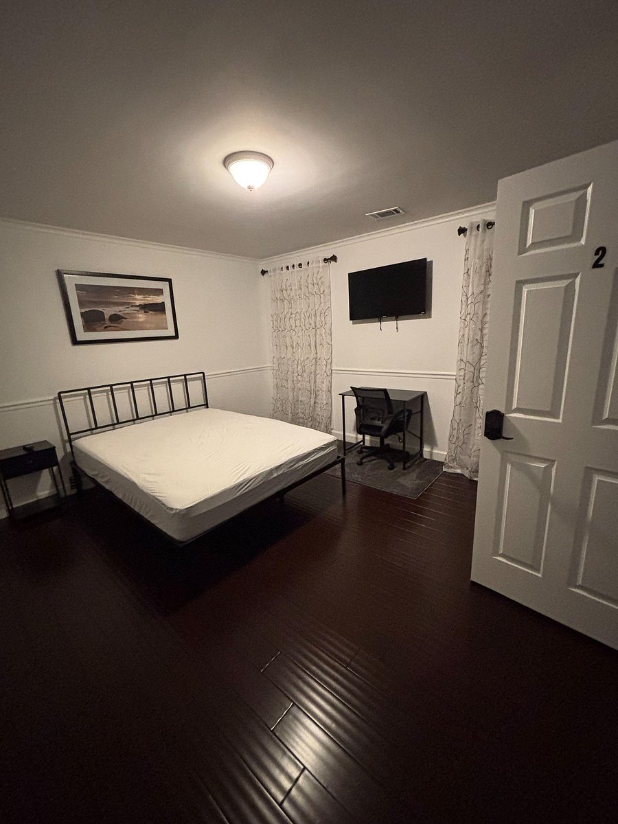 Spacious room with dresser and wardrobe