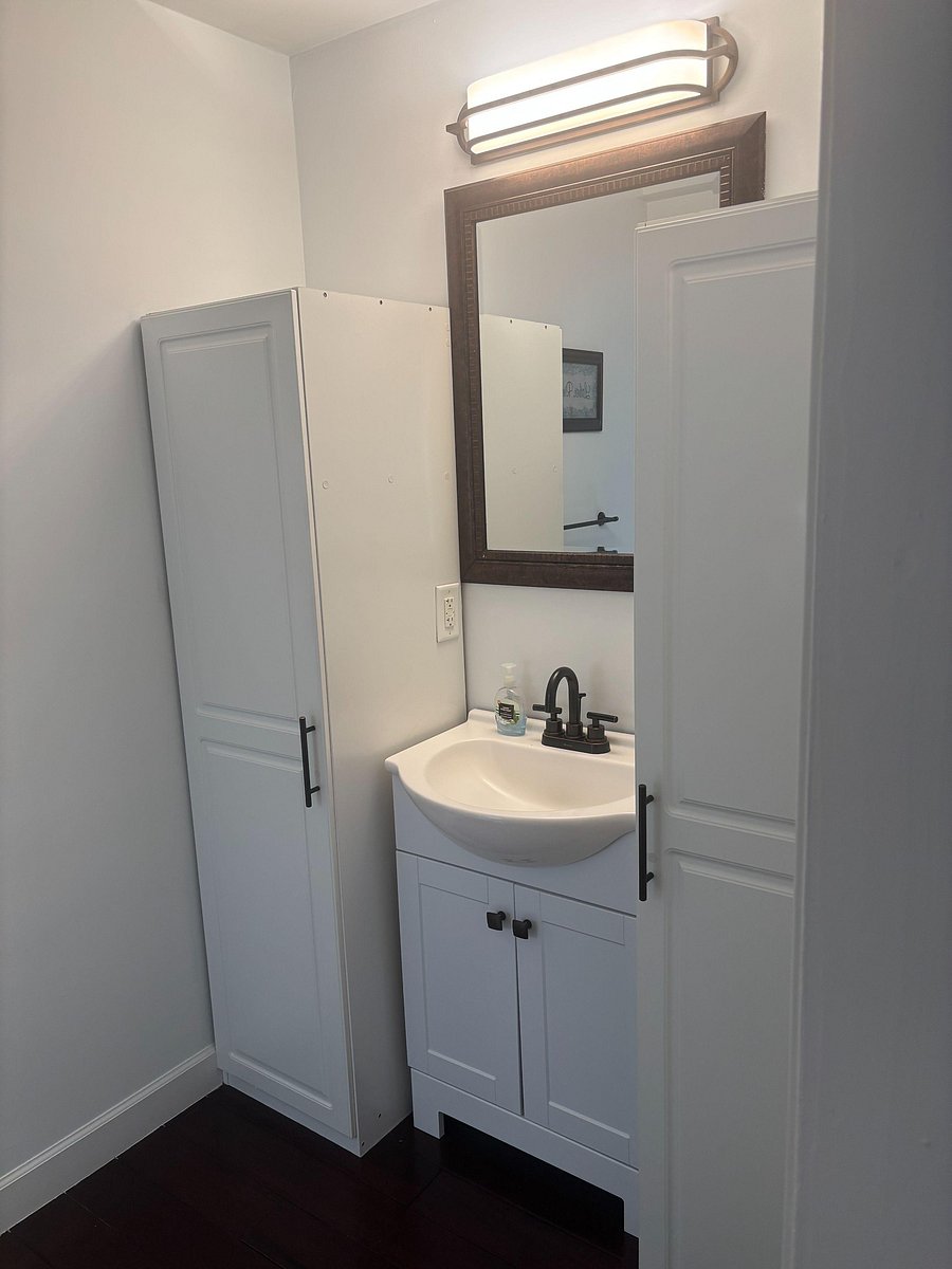 Additional storage space in bathroom. Can be used as a closet for clothing.