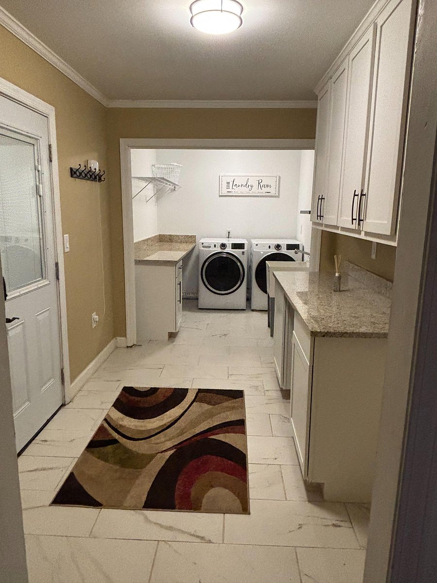 Pantry with additional cabinetry space for storage.