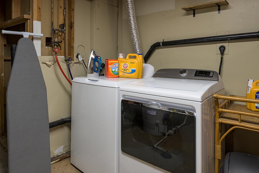 Shared laundry, washer, dryer, pods and sheets.