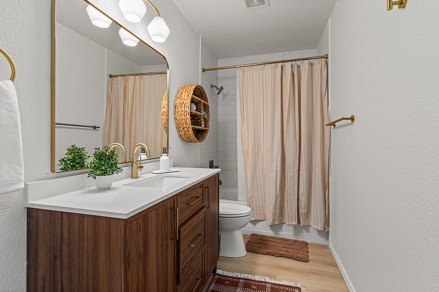 Shared Bathroom with Separate Storage Closet