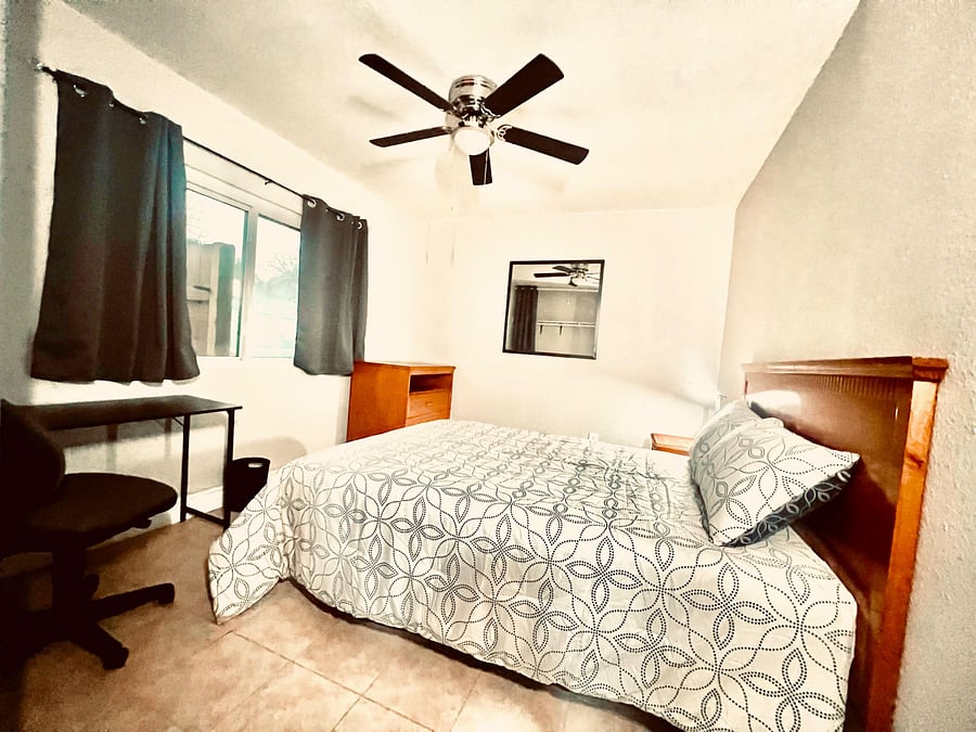 Oversized dresser. Blackout curtains and comfortable memory foam mattress for late sleep ins.