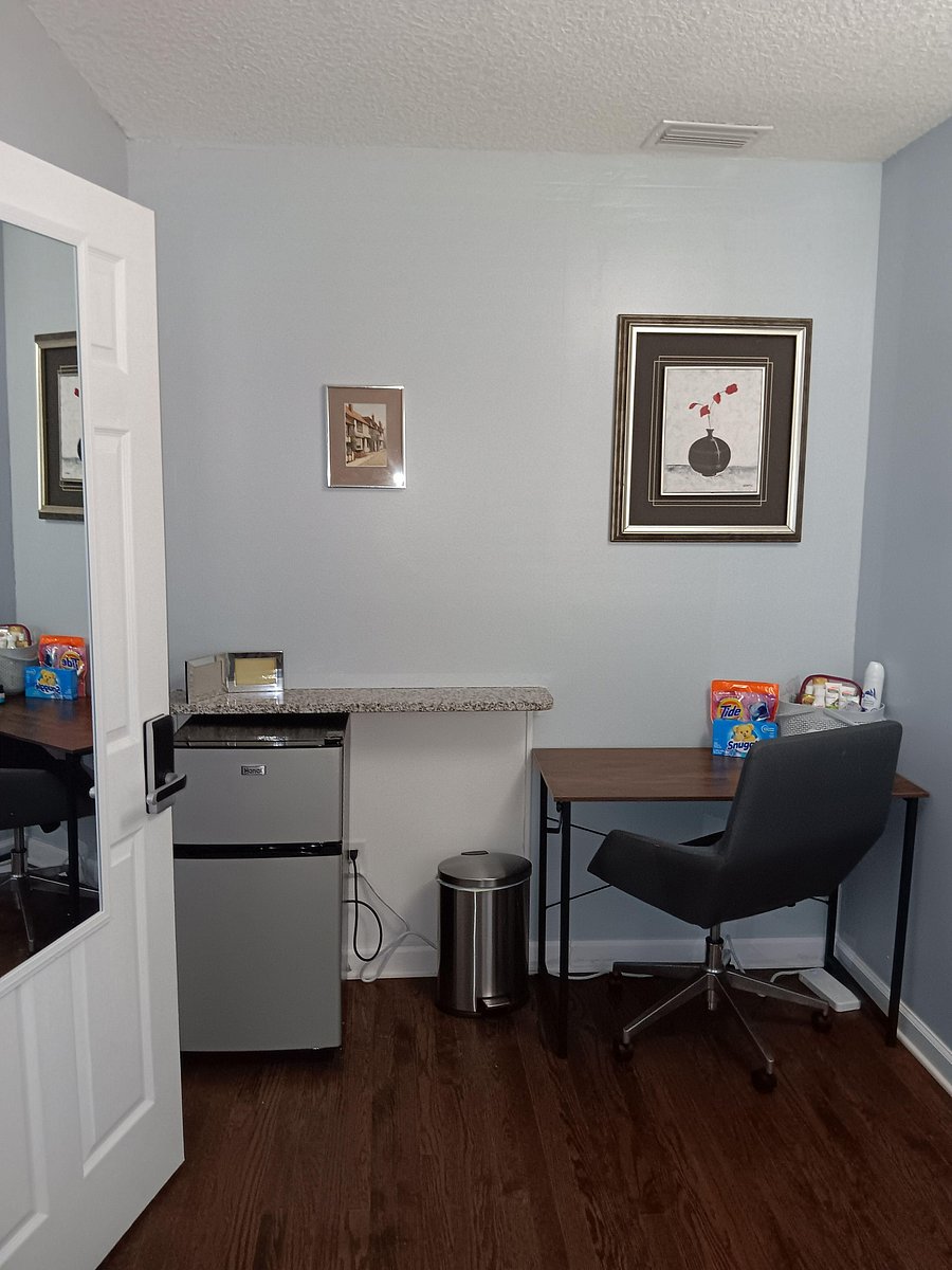Workspace area with granite ledge and mini-fridge
