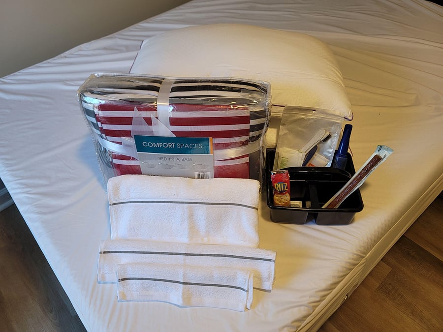 Bed in a Bag, Pillows, Towels and a few essentials provided in Move-In Fee.