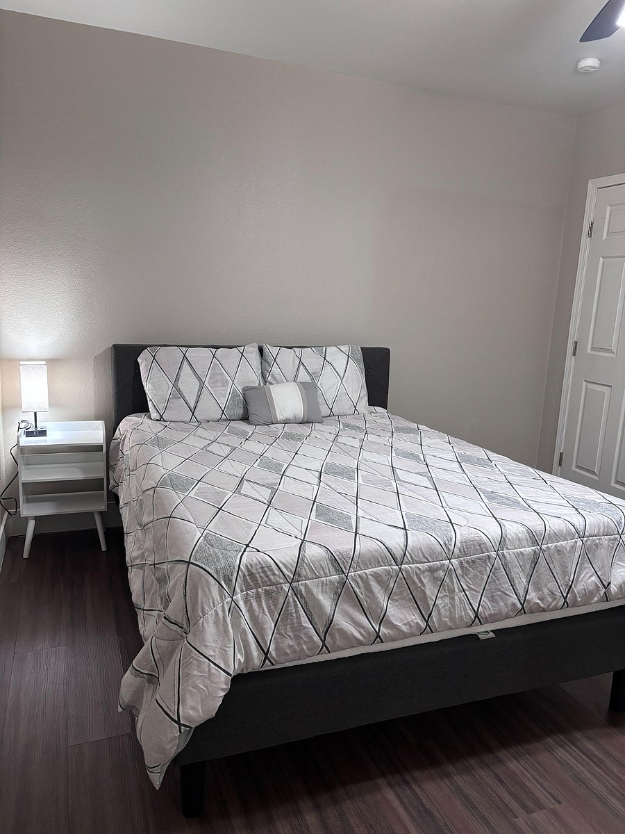Fourth room with queen bed