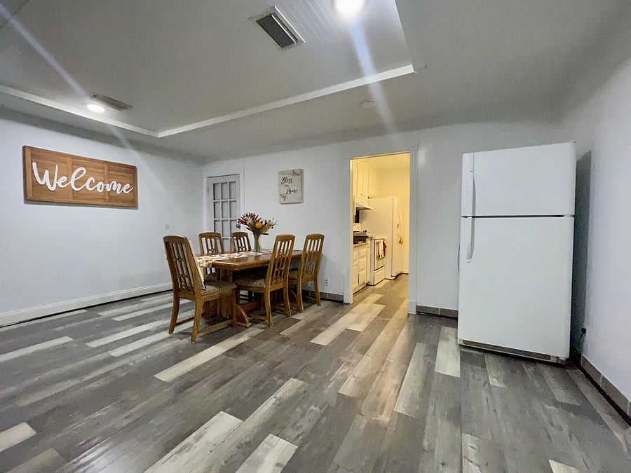 Dining room common area, entrance to kitchen, 2nd refrigerator with ample storage space