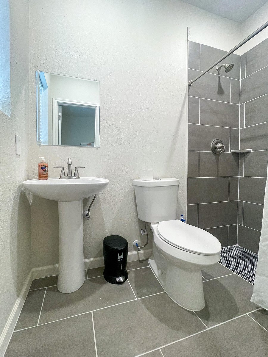 Bathrooms in each room.