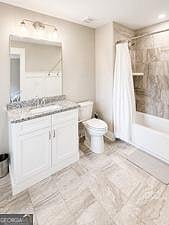 Full bathroom with granite-top vanity, framed mirror, tile flooring, and tub/shower combo with curtain.