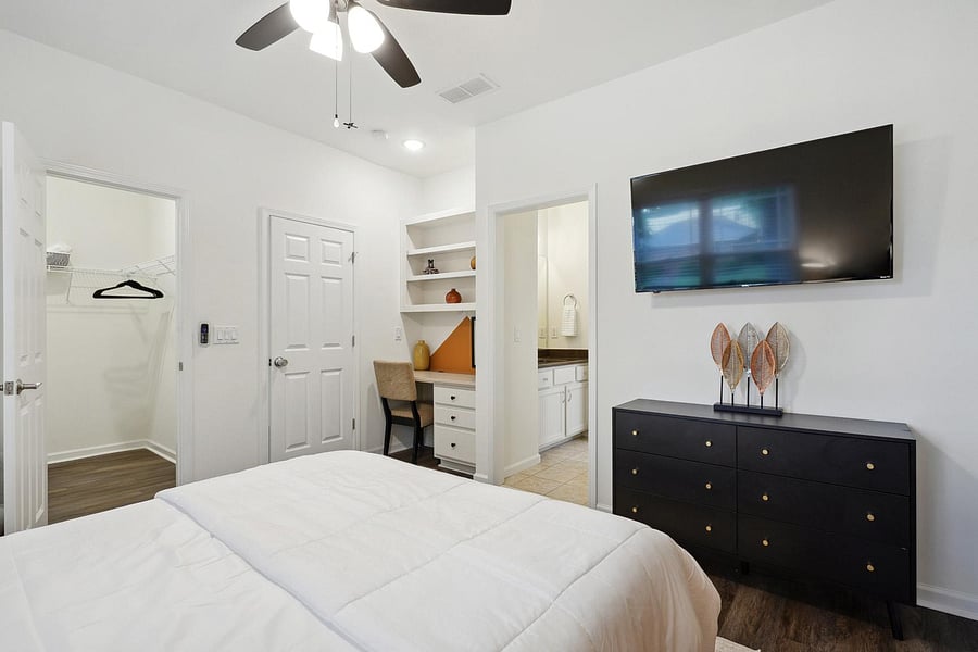 Another View of the Room Showing the Large Work Area, Lounge Chair and Private Vanity