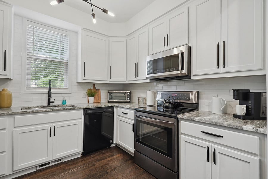 View of the Kitchen Stove, Microwave, Toaster Oven, Dishwasher