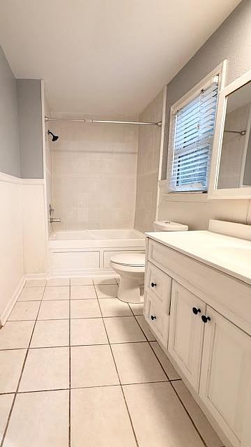 Full bathroom with bathtub