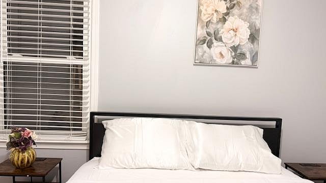 On the Main floor, Room 1 comes with Queen Bed with 2 nightstands comfortably with outlets and dresser