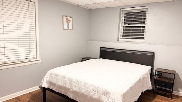 On Lower Level, Room 6 comes with Queen Bed with 2 nightstands comfortably with outlets and Closet that is shared with room 5