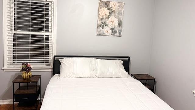 On the Main floor, Room 1 comes with Queen Bed with 2 nightstands comfortably with outlets and dresser