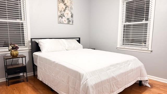 On the Main floor, Room 1 comes with Queen Bed with 2 nightstands comfortably with outlets and dresser