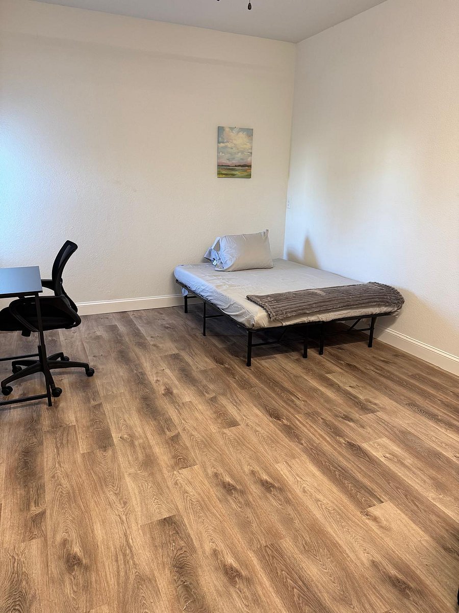 1st Level Fully furnished with a cozy bed, a sleek desk for work or study, and a roomy closet to keep everything.