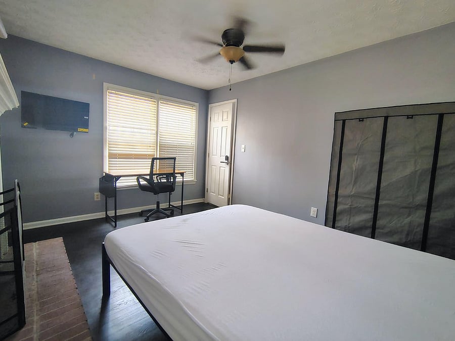 The newest room in the house with a work space and Smart TV.
