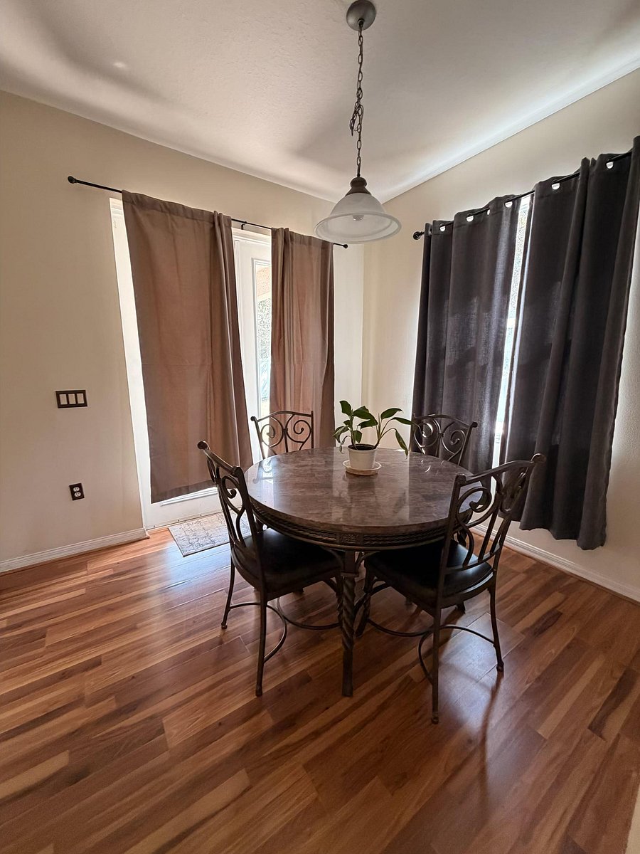 Dinning room by back door leading to back patio.