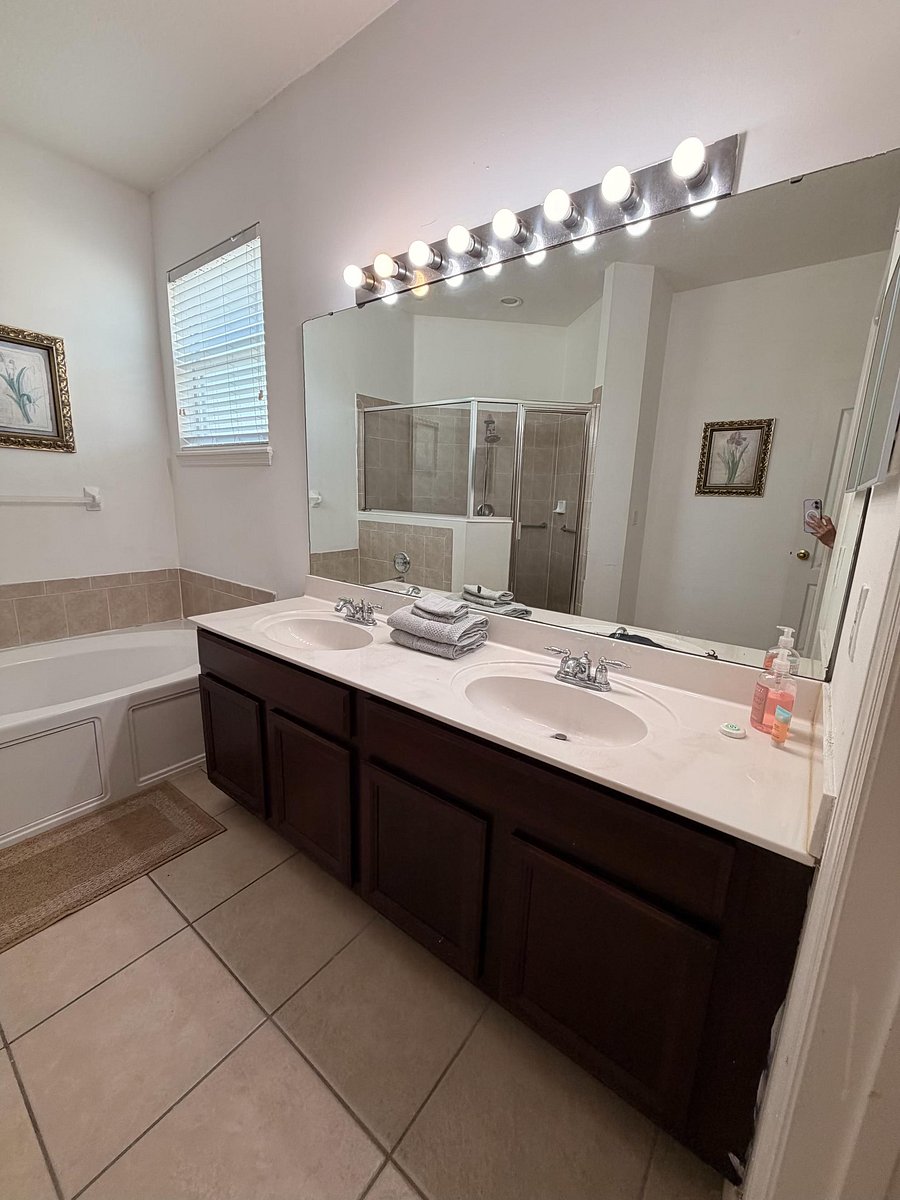 Spacious Master Bathroom with Double Vanity, Soaking Tub & Stand-Up Shower