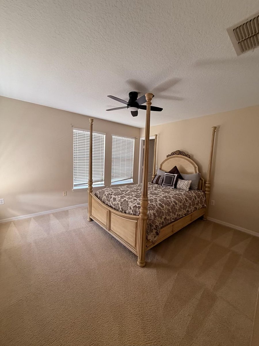 fourth spacious upstairs bedroom, with walk-in closet.