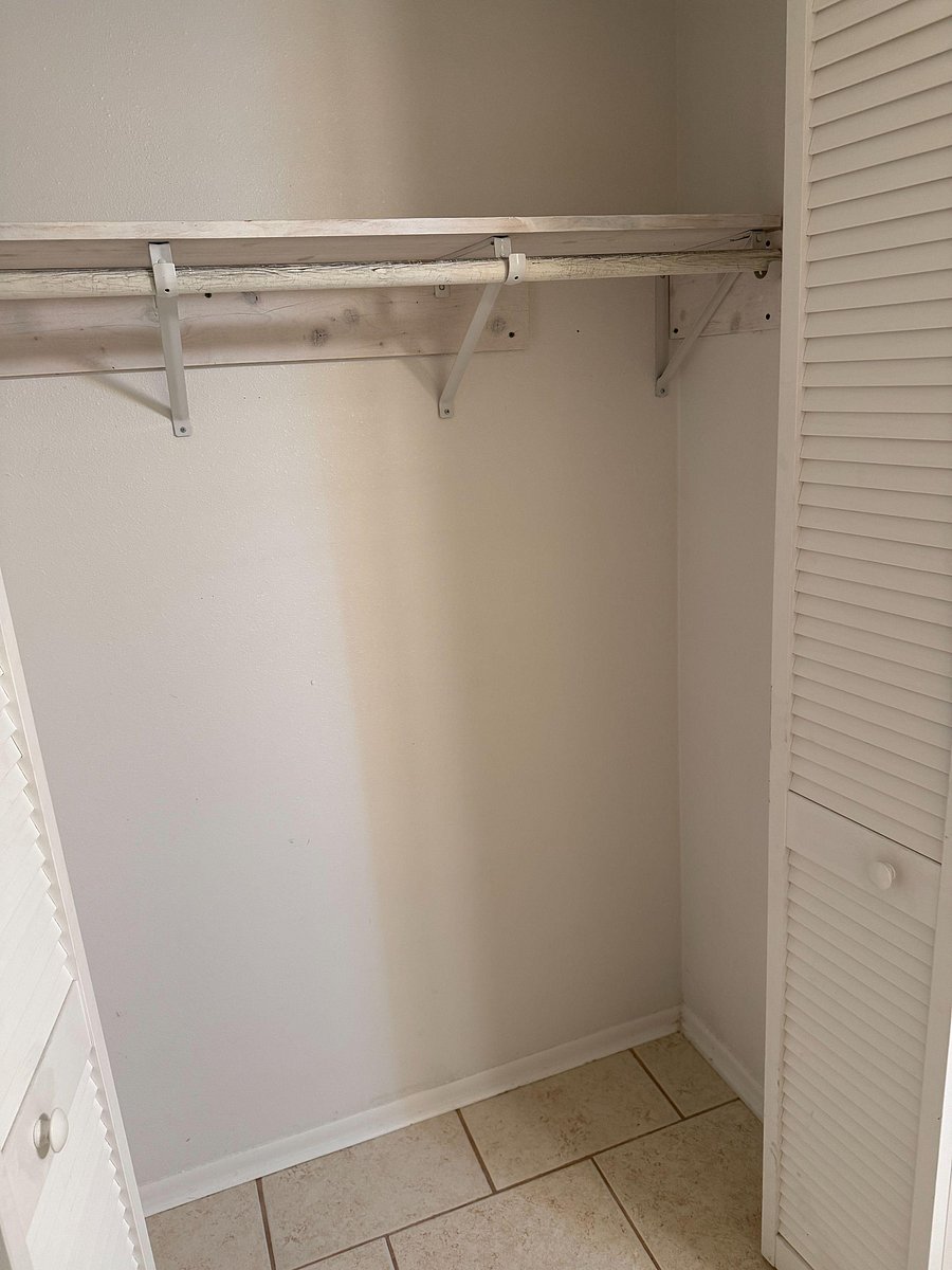 Closet shelf with clothes bar and she