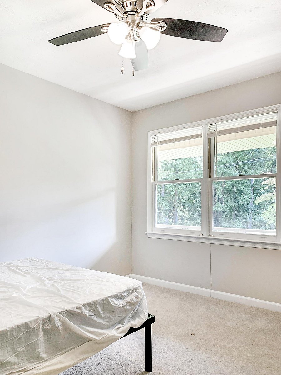 Dual windows in this bright bedroom!