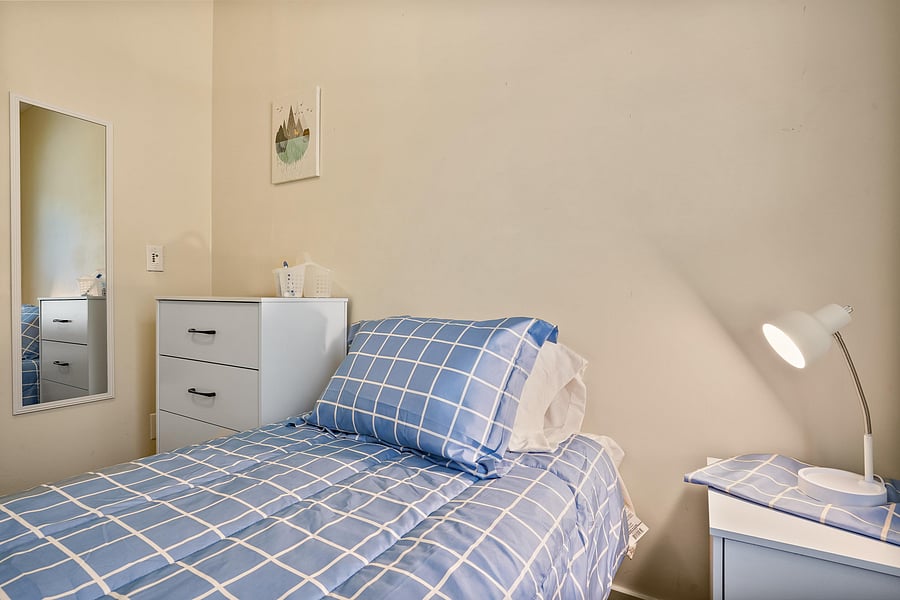 Room 6 comes with full bed, linens, TV, mini fridge, desk, chair, nightstand, clothing rack, dresser