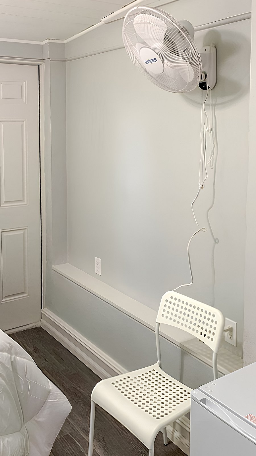 chair and wall fan