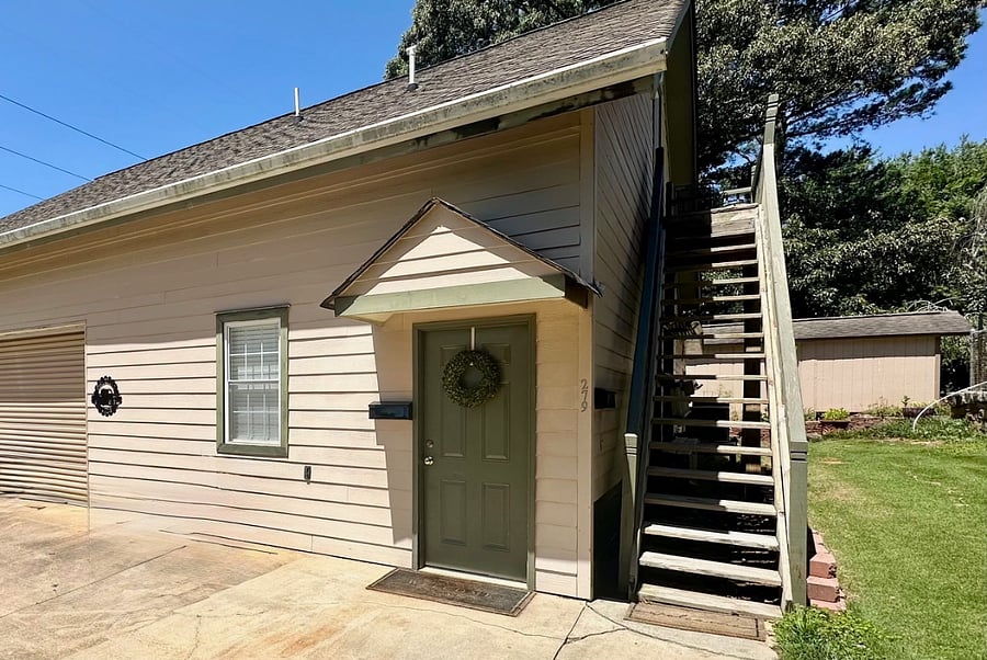 Covered front door of studio.  Parking adjacent. 