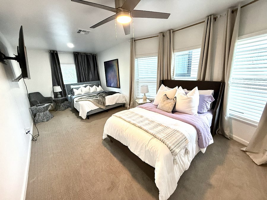 Largest upstairs bedroom - Roommate Set-up with 2 separate sleeping areas, 65 inch Smart TV, ceiling fan & closet