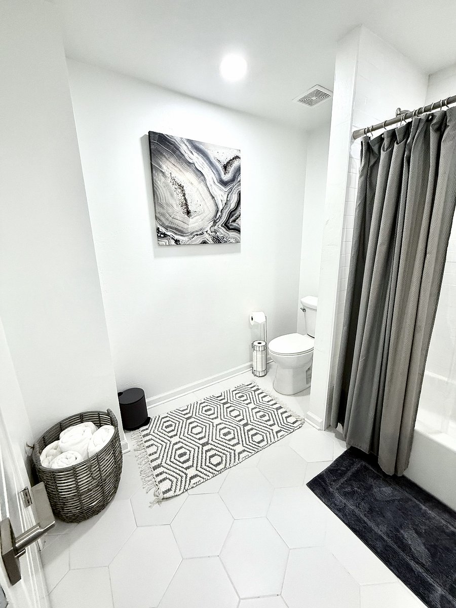 Over-sized Full Bathroom Upstairs with Tub/Shower Combo. Shared by both upstairs secondary bedrooms