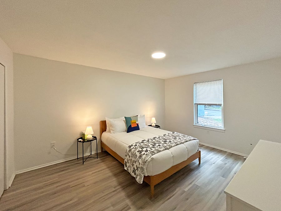 Primary bedroom with queen bed, luxury mattress and high quality cotton linens. Large closet and dresser.