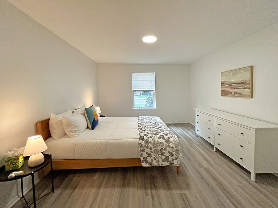 Primary bedroom with queen bed, luxury mattress and high quality cotton linens. Large closet and dresser.
