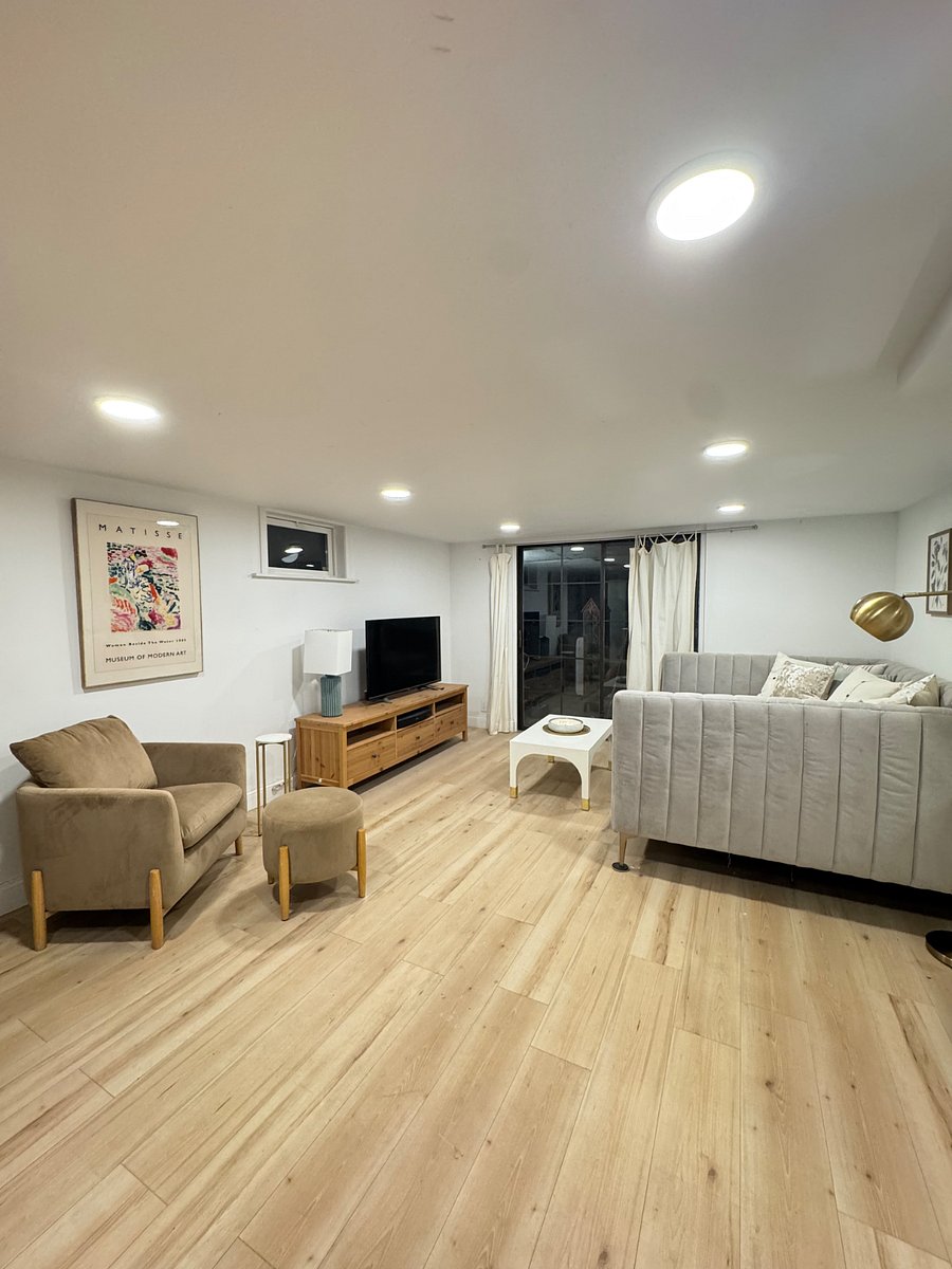 Living Room, picture taken from the kitchenette, looking at the entry glass door (key locked and safety bar)